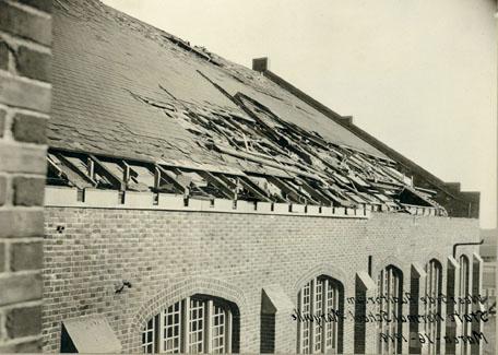 The tornado, which destroyed the Green House, also tore off a portion of the Administration Building roof.