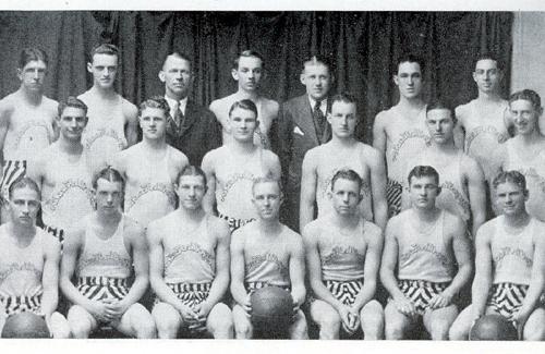 Milner is seated on the end of the front row (left) with his other Bearcat Basketball teammates.