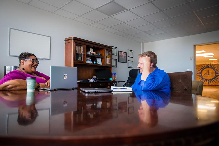 Leslie Doyle meets with Kirk Skoglund ’12, the director of the Learning Center at Rockhurst University, to discuss initiatives for the upcoming academic year. As she settles into her new role at Rockhurst, 
